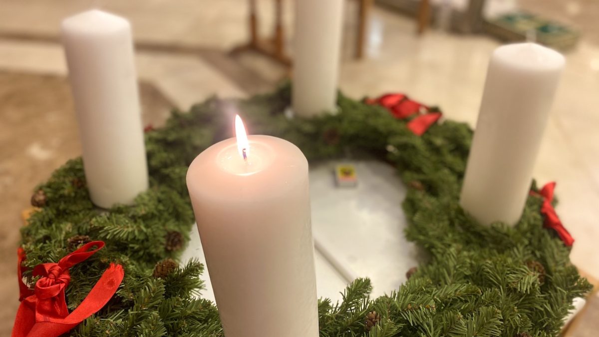Christmas Advent Wreath with lit candle
