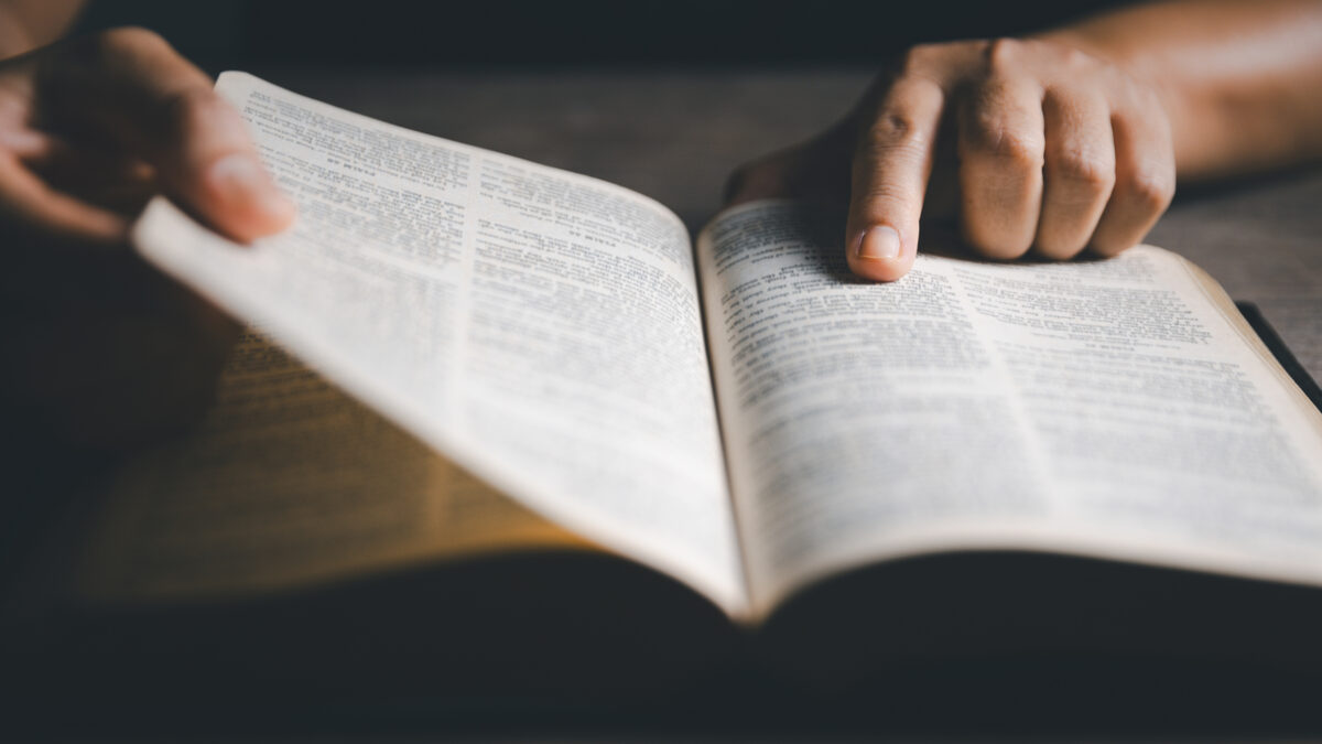 Worship christian with bible concept. Young woman person hand holding holy bible with study at home. Adult female christian reading book in church. Girl learning religion spirituality and pray to god.