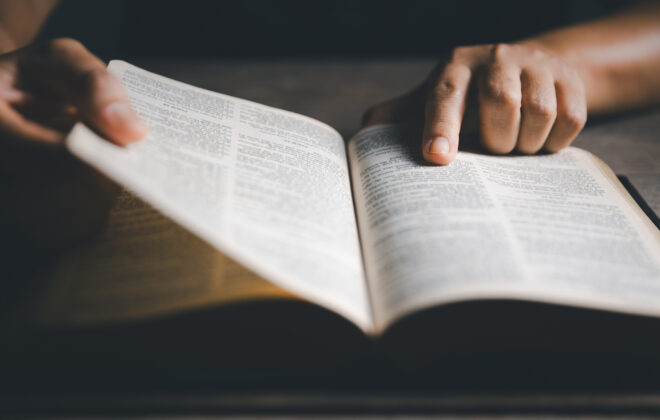 Worship christian with bible concept. Young woman person hand holding holy bible with study at home. Adult female christian reading book in church. Girl learning religion spirituality and pray to god.